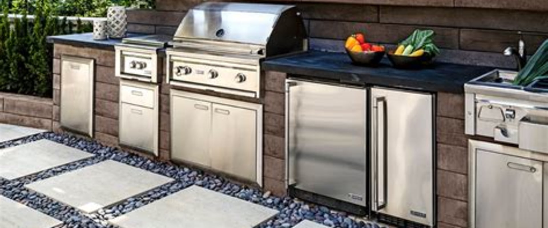 Paver Installation Trends That Pair Well with Outdoor Kitchen Cabinets